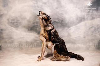Illustration for article titled This Painting of a Wolf Is Actually Hiding Three People in Bodypaint